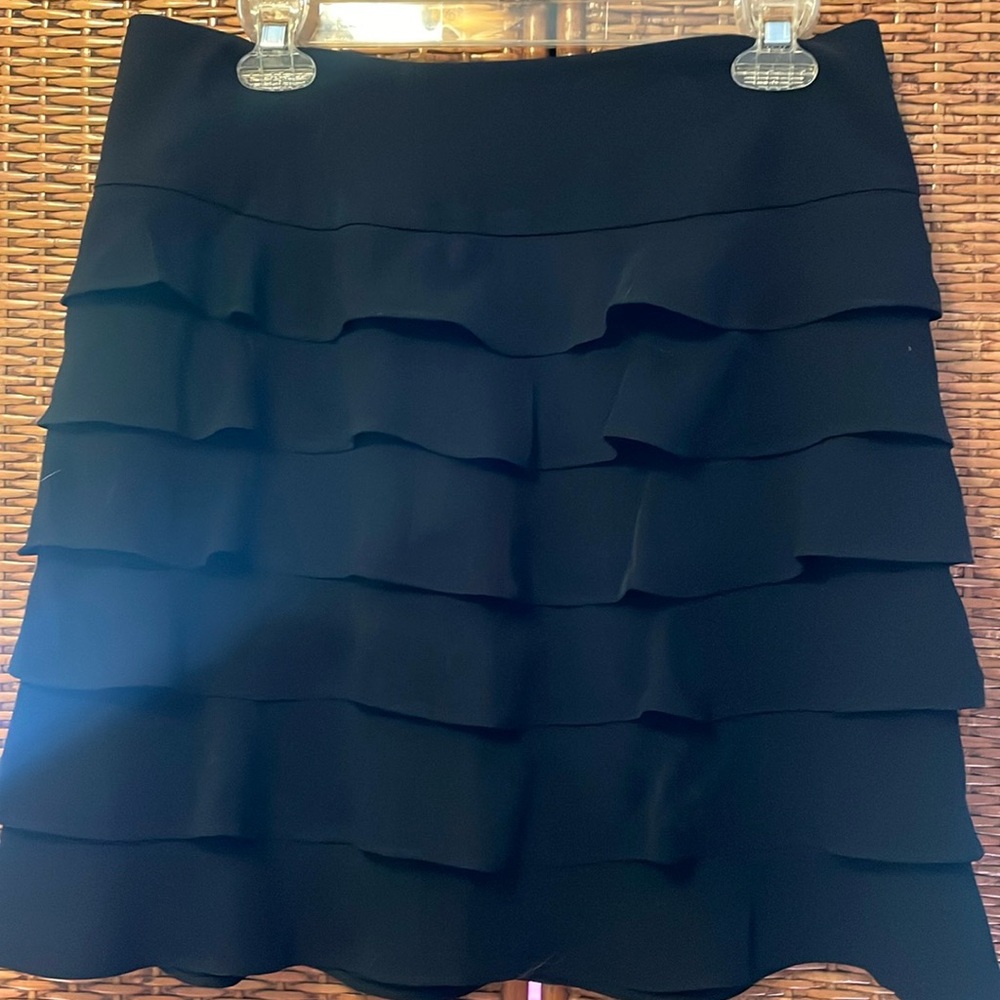 Beautiful INC black tiered ruffles skirt with back zip. Size 10 EUC flattering